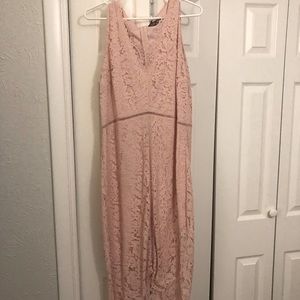 Women’s delicate lace dress, knee length, hi-low cut. Beautiful details.